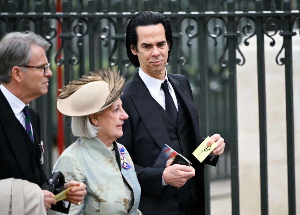 Nick Cave makes his way to the church (PA)
