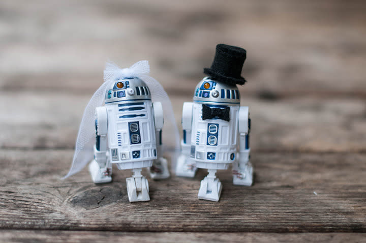 Imagine these cuties as your wedding cake toppers