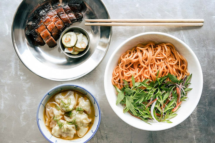 A flavourful meal at Fifty Tales (clockwise from top left): 'char siu' with in-house glaze; 'mee ulam' tossed in 'budu' and lacto-fermented chilli; and 'wonton rasam.' – Pictures courtesy of Fifty Tales