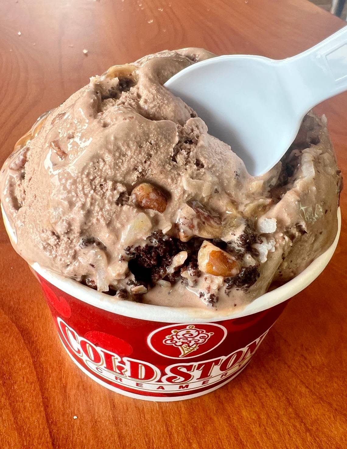 A cup of “Germanchökolätekäke” from the new Cold Stone Creamery in Macon. This signature creation combines chocolate ice cream with pecans, coconut, brownie and caramel.