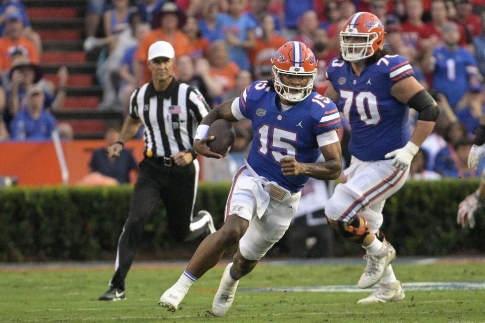 Florida quarterback Anthony Richardson scrambles during the first half of a win over Utah on Sept. 3.