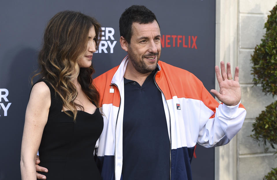 Jackie Sandler and Adam Sandler arrive at the Los Angeles premiere of "Murder Mystery," at the Regency Village Theatre, Monday, June 10, 2019, in Westwood, Calif. (Photo by Jordan Strauss/Invision/AP)