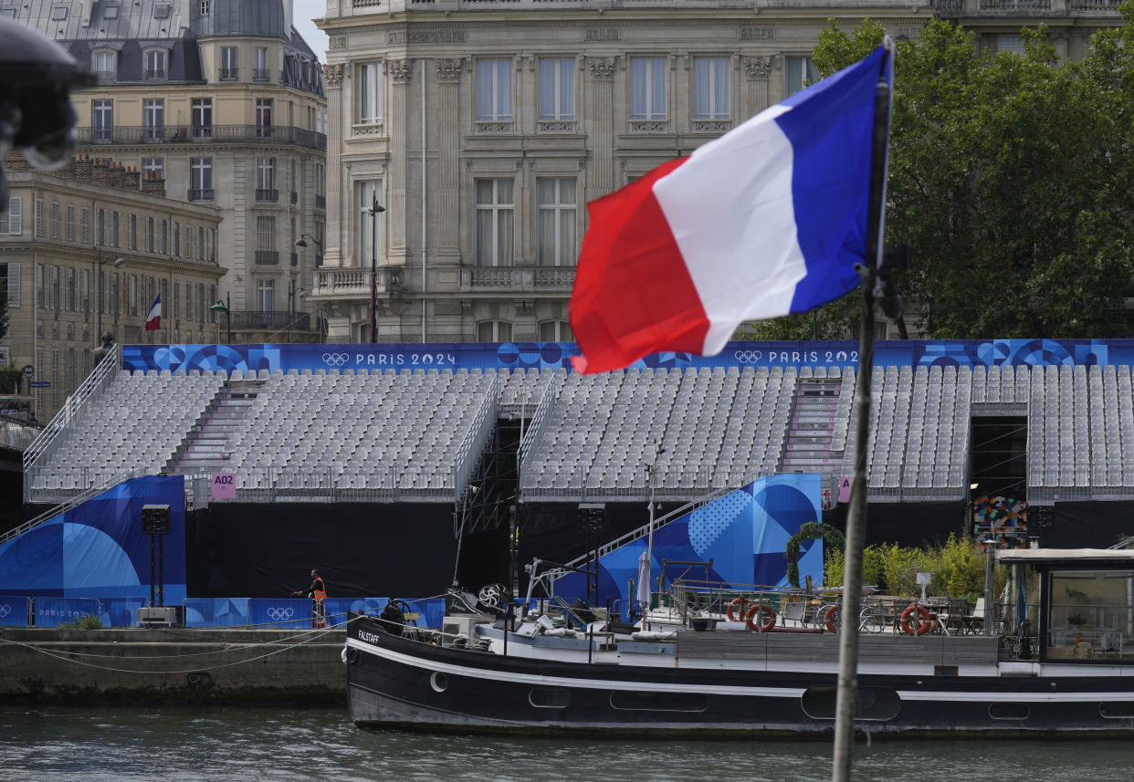 Approximately 6,800 athletes will be on 90 boats during the 3.7-mile Paris Olympic Opening Ceremony parade route. (Adrian Wyld /The Canadian Press via AP)