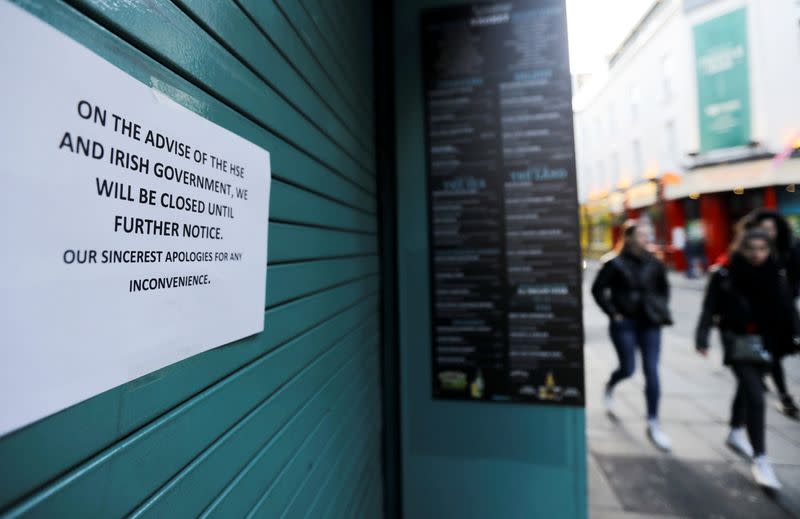 Pub doors are locked in the Temple Bar area, as bars across Ireland close voluntarily to curb the spread of coronavirus in Dublin