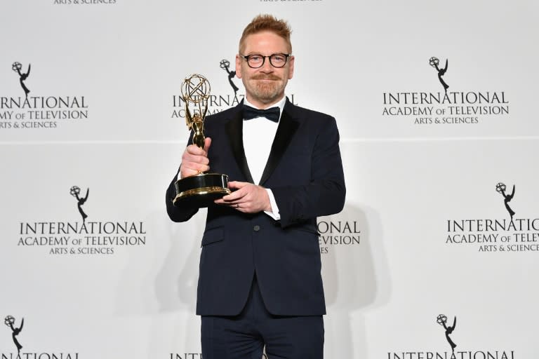 Kenneth Branagh poses with award for best performance by an actor for his work in "Wallander" at the 45th International Emmy Awards