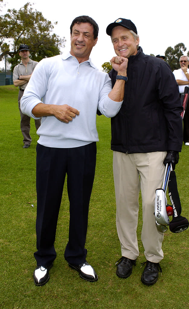 With Michael Douglas at The 6th Annual Golf Classic in 2004