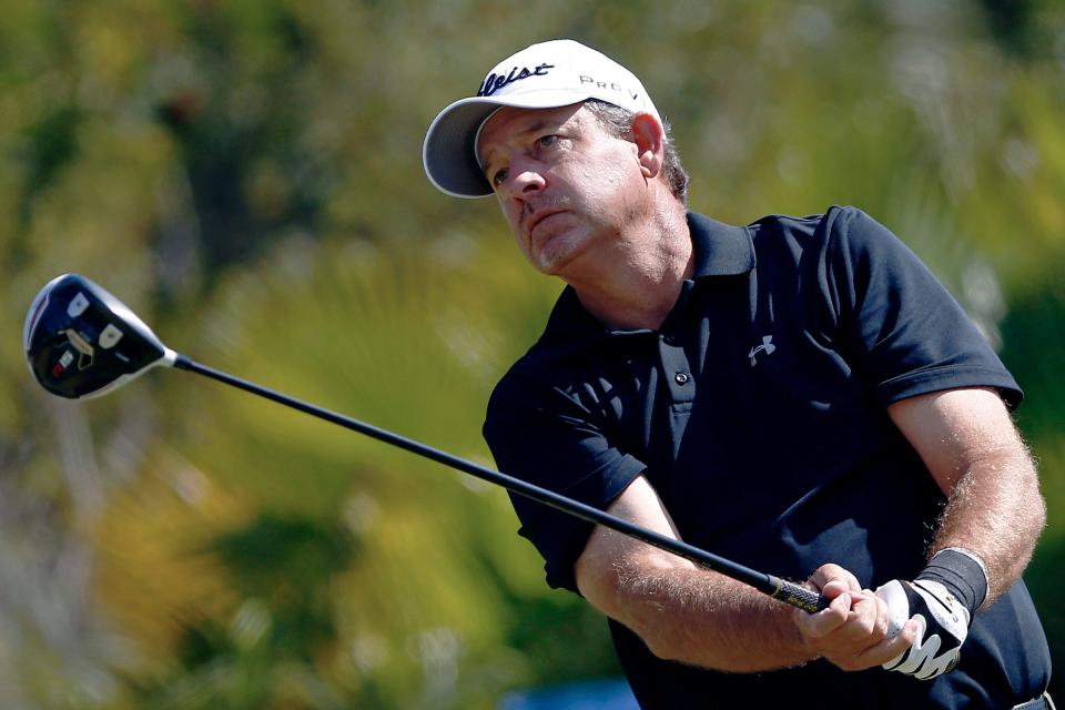 FILE - Bart Bryant tees off on the eighth hole, Feb. 15, 2015, during the 2015 ACE Group Classic golf tournament in Naples, Fla. Professional golfer Bryant was killed and his wife was injured when a truck slammed into their SUV while they were stopped in a line of vehicles on a central Florida roadway for a construction crew, authorities said Wednesday, June 1, 2022. (Corey Perrine/Naples Daily News via AP, File)