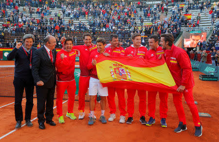 Tennis - Davis Cup - Quarter Final - Spain vs Germany - Plaza de Toros de Valencia, Valencia, Spain - April 8, 2018 Spain's David Ferrer, Rafael Nadal and team mates celebrate winning quarter final REUTERS/Heino Kalis