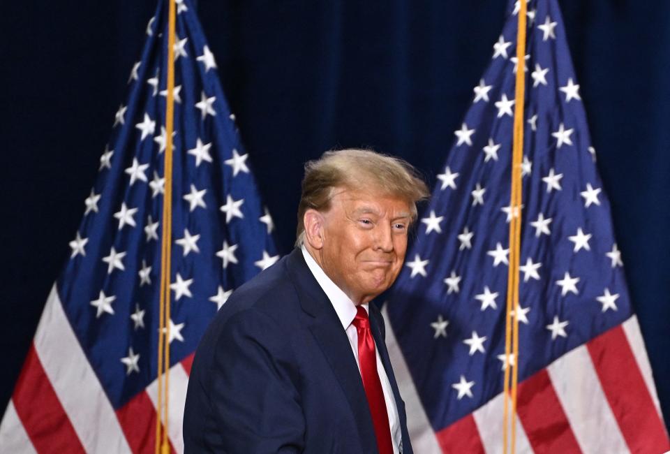 Former US President and Republican presidential hopeful Donald Trump arrives to speaks at a watch party during the 2024 Iowa Republican presidential caucuses in Des Moines, Iowa, on January 15, 2024. Trump told Americans Monday "it is time for our country to come together" after he won the Iowa caucuses, cementing his status as the likely Republican challenger to take on President Joe Biden in November's election.