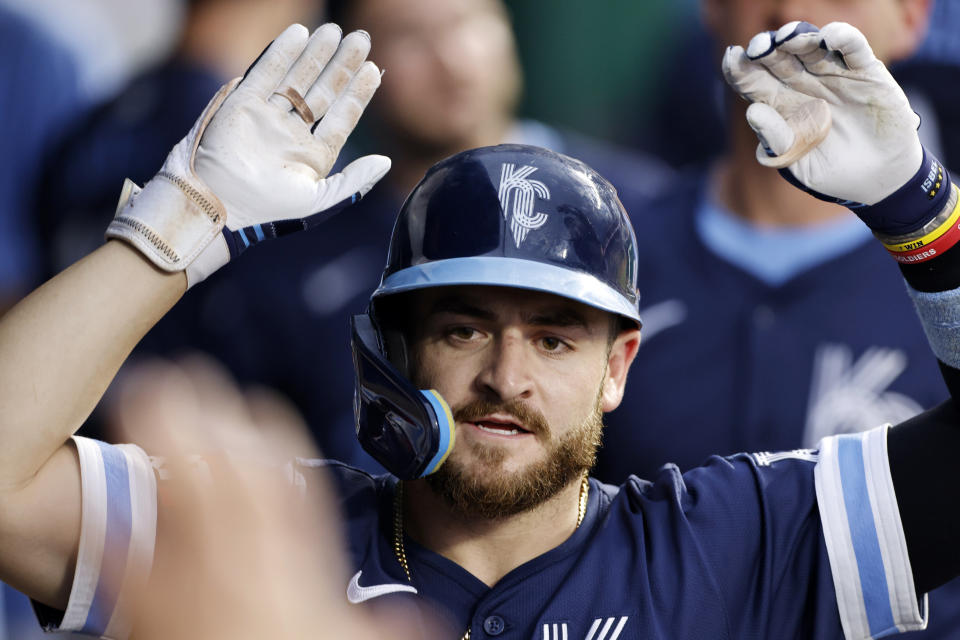 Kansas City Royals' Kyle Isbel celebrates in the dugout after his home run against the Cleveland Guardians during the fourth inning of a baseball game in Kansas City, Mo., Friday, June 28, 2024. (AP Photo/Colin E. Braley)