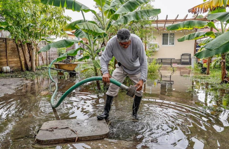 Allapattah resident Marvin Morales isn’t relying on government officials to fix the flooding in his neighborhood. On Thursday, June 13, 2024, his own pump was draining out the water that flooded his backyard in Miami. This isn’t the only measure he’s taken to fight the flooding. He built a concrete wall around his back porch two years ago. Before that, water would flood and reach his windows. The same wall saved him from home damage this year. Morales said commissioners come into this neighborhood to campaign, but they don’t actually maintain the streets.