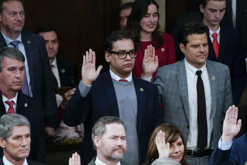 George Santos and other members of Congress are sworn into office on Jan. 7, 2023. <a href="https://media.gettyimages.com/id/1246172509/photo/fourth-day-of-118th-congress.jpg?s=1024x1024&w=gi&k=20&c=VZpuLG0oZTTghKfdWqOBYoM59EJ6k8tiiCECK5mYY9c=" rel="nofollow noopener" target="_blank" data-ylk="slk:Elizabeth Frantz/For The Washington Post via Getty Images;elm:context_link;itc:0;sec:content-canvas" class="link ">Elizabeth Frantz/For The Washington Post via Getty Images</a>