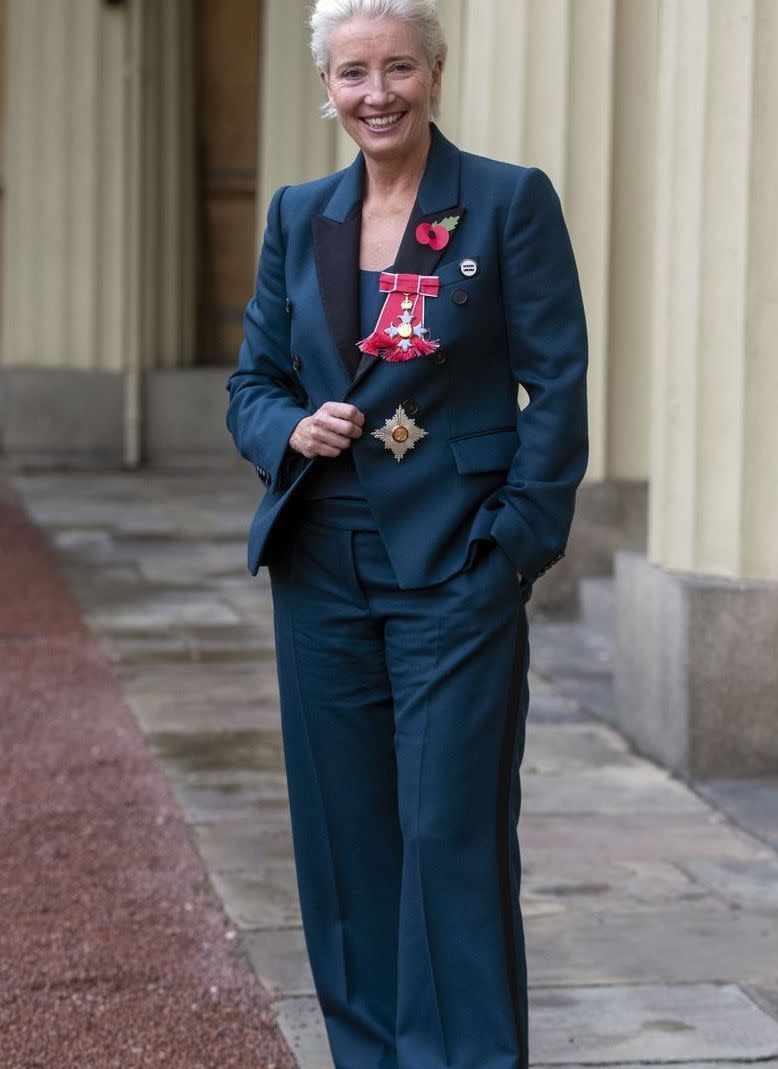 <p>Emma Thompson isn’t about to change her style just because she’s heading to the palace. The always-cool actress rocked white sneakers with her navy suit set to receive her damehood honor at Buckingham Palace. </p>