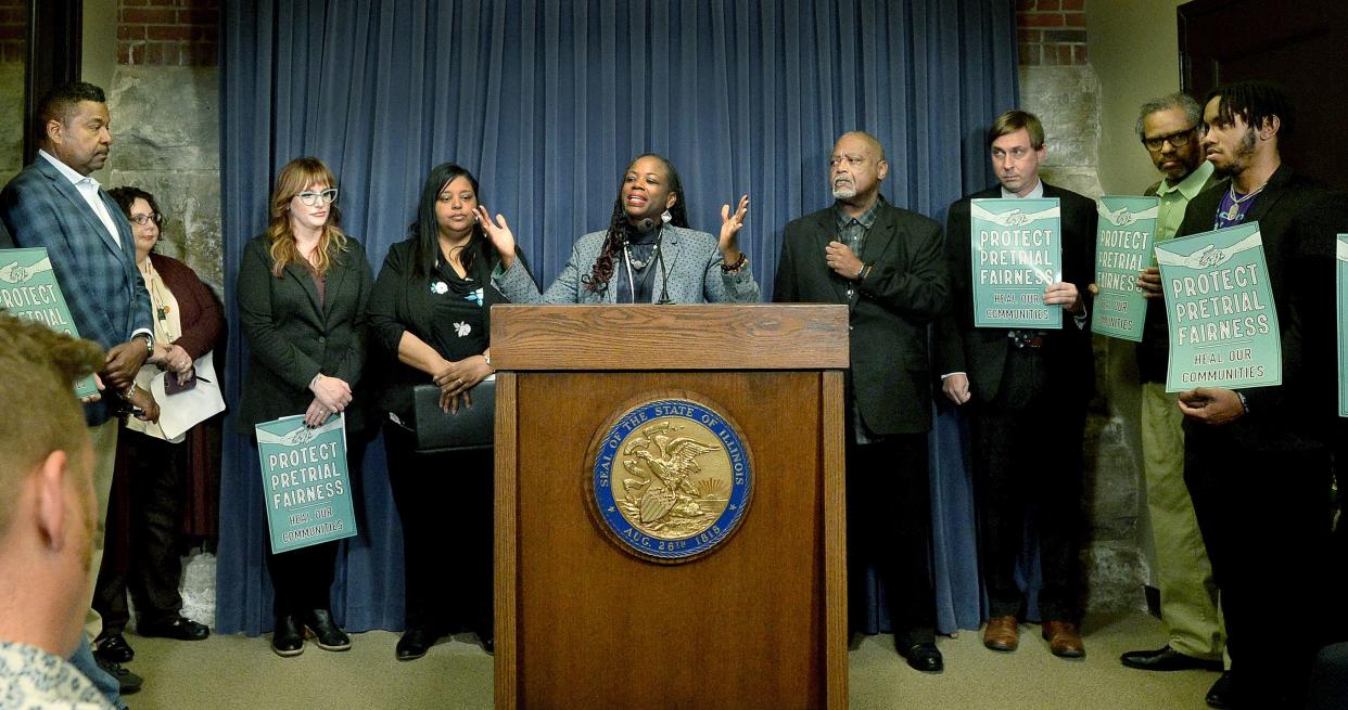 State Rep. Carol Ammons, D-Urbana,  center, speaks during a press conference on the end of cash bail at the Illinois State Capitol Monday, Sept. 18, 2023.