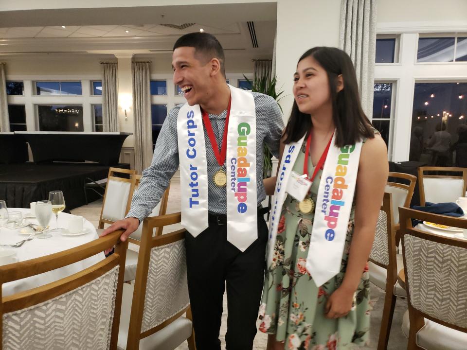 Immokalee High School seniors and Guadalupe Center Tutor Corps graduates Gabriel Ramirez and Evelyn Franco laugh while talking to friends after a celebration dinner honoring the accomplishments of Tutor Corps students on Tuesday, April 16, 2019, at Grey Oaks Country Club. Gabriel asked Evelyn to prom when the event ended.