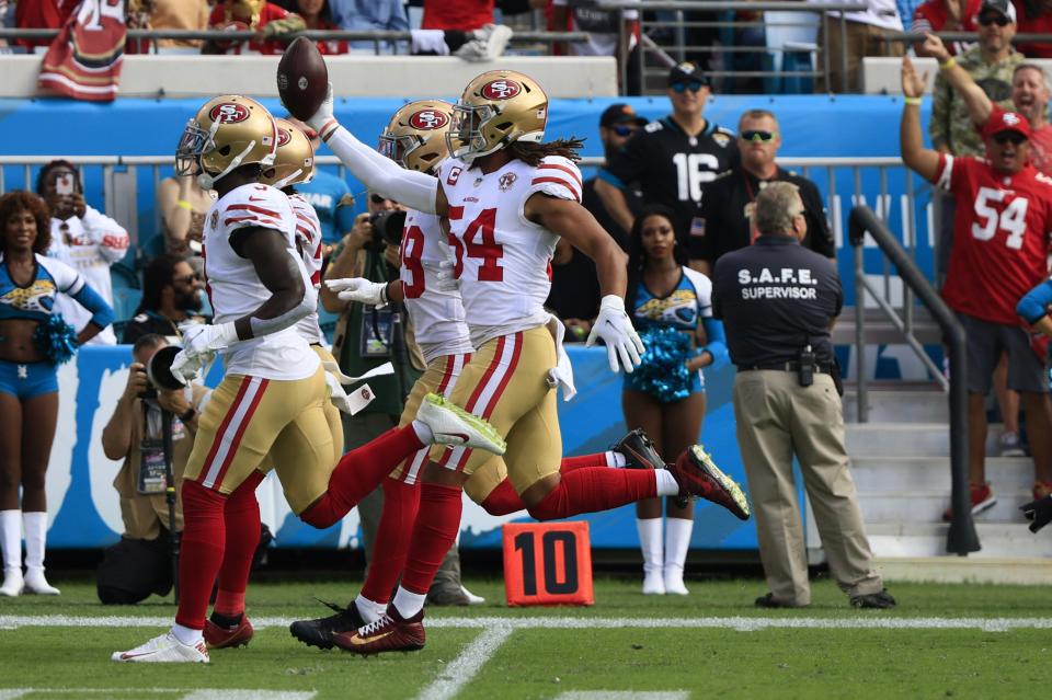 San Francisco 49ers linebacker Fred Warner (54) celebrates with teammates a turnover during the second quarter at TIAA Bank Field Sunday, Nov. 21, 2021 in Jacksonville. The Jacksonville Jaguars hosted the San Francisco 49ers during a regular season NFL game. [Corey Perrine/Florida Times-Union]