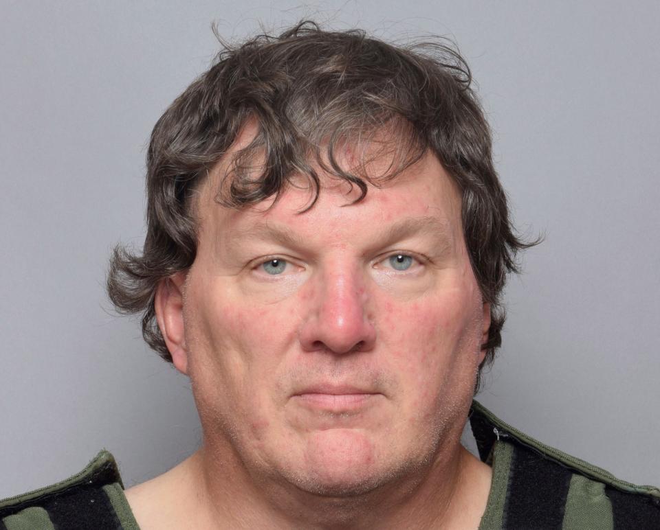 This booking image provided by Suffolk County Sheriff’s Office, shows Rex Heuermann.