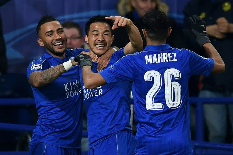 Leicester City's striker Shinji Okazaki (C) celebrates scoring against Club Brugge on November 22, 2016