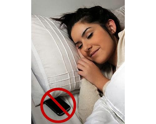 Phone tucked under a pillow