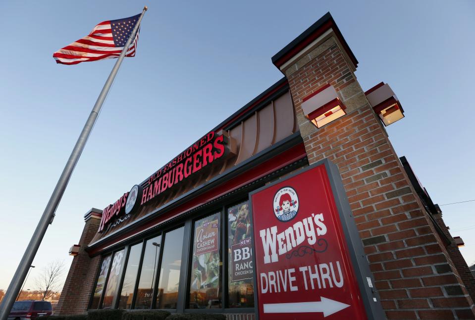 FILE - This Friday, March 21, 2014, file photo shows a Wendy's restaurant in Providence, R.I. The Wendy's Co. reports earnings Wednesday, Aug. 9, 2017. (AP Photo/Michael Dwyer, File)