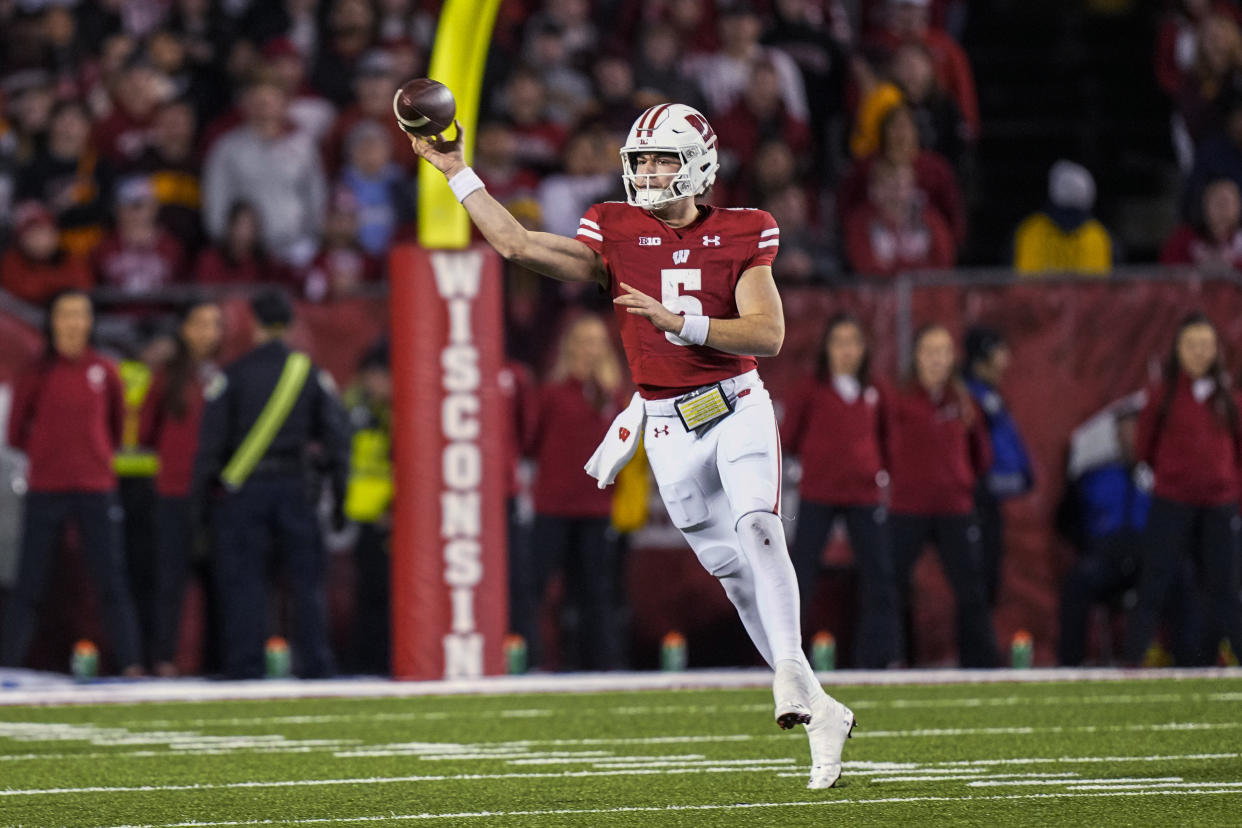 Quarterback Graham Mertz (5) had an up-and-down three-year stint as Wisconsin's signal caller. (AP Photo/Andy Manis)