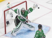 Dallas Stars goaltender Anton Khudobin (35) makes a save against the Tampa Bay Lightning during the third period of Game 4 of the NHL hockey Stanley Cup Final, Friday, Sept. 25, 2020, in Edmonton, Alberta. (Jason Franson/The Canadian Press via AP)