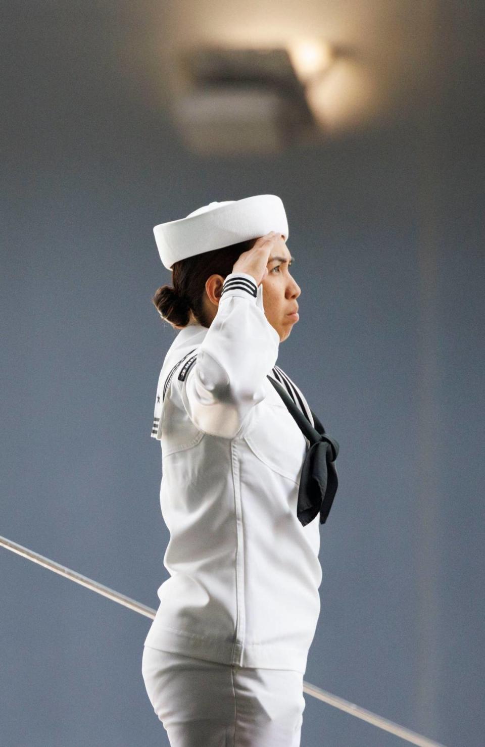 A naval sailor salutes as she leaves the USS Bataan during the opening day of Fleet Week on Monday, May 6, 2024, at Norwegian Cruise Lines Terminal in PortMiami. Alie Skowronski/askowronski@miamiherald.com