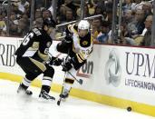 PITTSBURGH - NOVEMBER 10: Ben Lovejoy #6 of the Pittsburgh Penguins checks Brad Marchand #63 of the Boston Bruins at Consol Energy Center on November 10, 2010 in Pittsburgh, Pennsylvania. (Photo by Justin K. Aller/Getty Images)