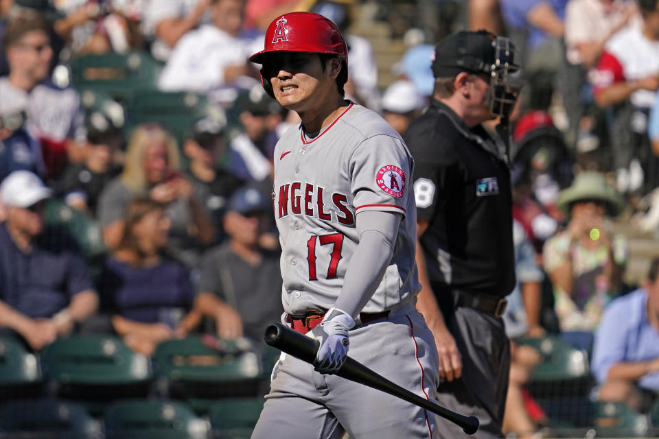 Los Angeles Angels designated hitter Shohei Ohtani, of Japan, reacts as he walks back to the dugout after striking out swinging during the seventh inning of a baseball game against the Chicago White Sox in Chicago, Thursday, Sept. 16, 2021. (AP Photo/Nam Y. Huh)