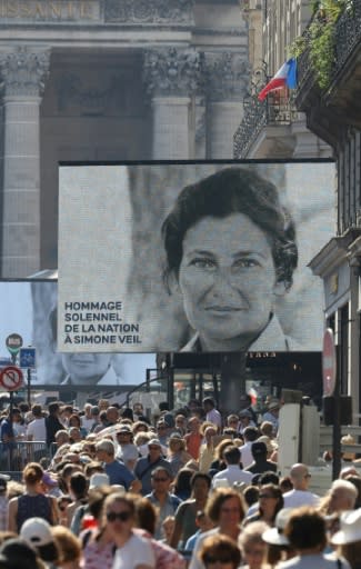 As the sun beat down, a large crowd gathered outside the Pantheon in Paris, the final resting place for the coffins of Holocaust survivor Simone Veil and her husband Antoine