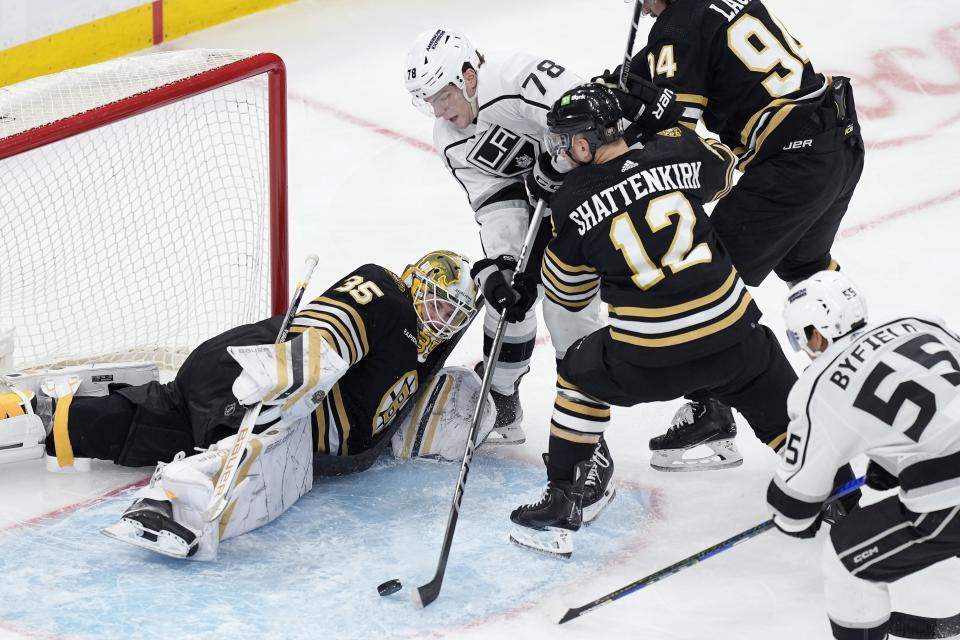 Los Angeles Kings' Alex Laferriere (78) sets up to score on Boston Bruins' Linus Ullmark (35) during the third period of an NHL hockey game, Saturday, Feb. 17, 2024, in Boston. (AP Photo/Michael Dwyer)