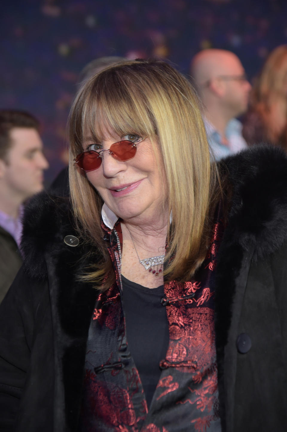 Penny Marshall channels Penny Lane with her round rose-colored glasses.