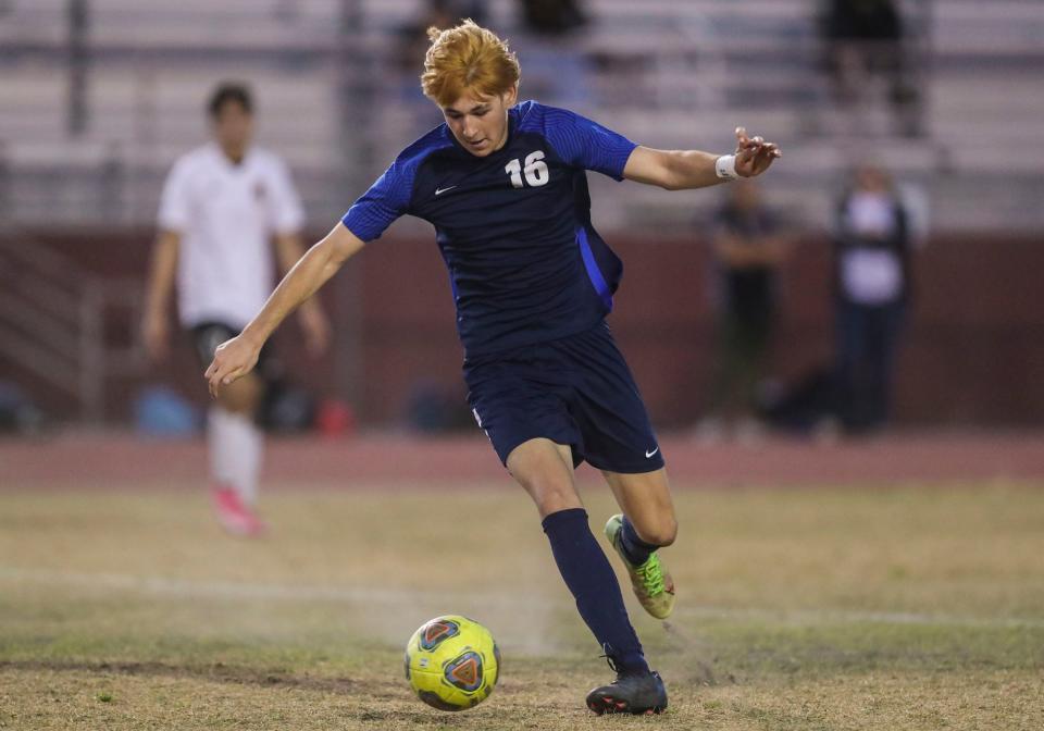 La Quinta's Kevin Franjic (16) passes the ball during the first half of their CIF-SS playoff game at La Quinta High School in La Quinta, Calif., Friday, Feb. 11, 2022. 