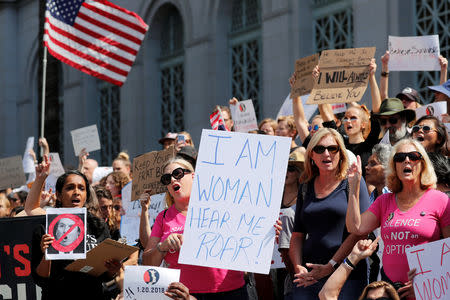 Demonstrators gather outside Los Angeles City Hall to protest the Senate Judiciary committee's vote on President Trump's U.S. Supreme Court pick Brett Kavanaugh, in Los Angeles, California, U.S., September 28, 2018. REUTERS/Mike Blake