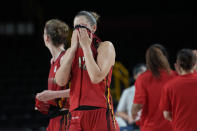 Belgium's Jana Raman (42) and teammates walk off the court after their loss to Japan in a women's basketball quarterfinal game at the 2020 Summer Olympics, Wednesday, Aug. 4, 2021, in Saitama, Japan. (AP Photo/Eric Gay)