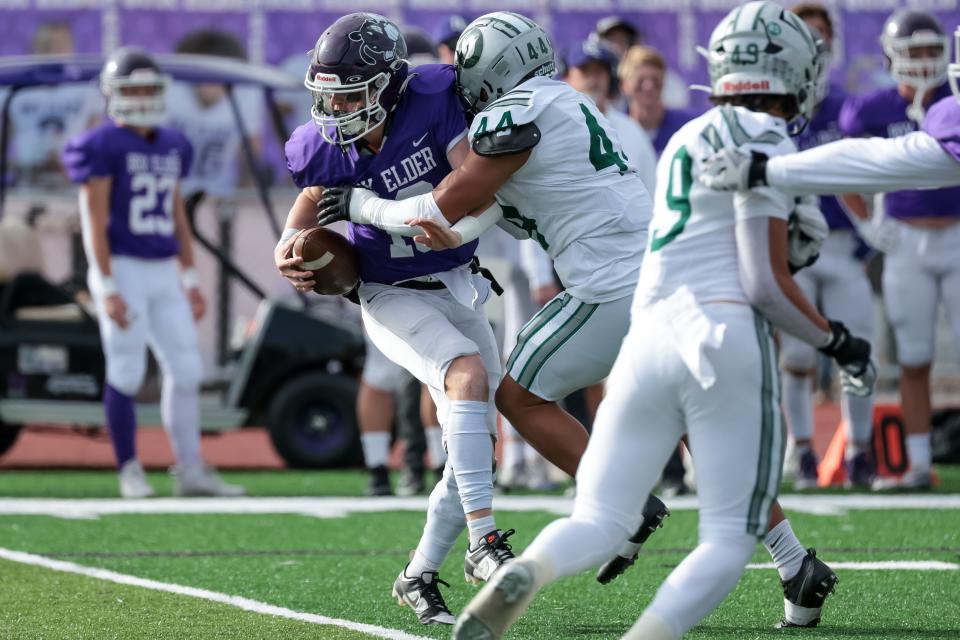 Olympus’ Andre Leota sacks Box Elder quarterback Ryan Griffin in a 5A quarterfinal high school football game in Brigham City on Friday, Nov. 3, 2023. | Spenser Heaps, Deseret News