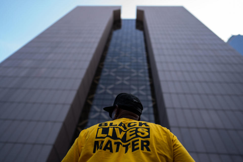 George Floyd's murder one year ago sparked nationwide protests and pledges from all across society to do more in combatting systemic racism. But it sure feels like a massive uphill fight remains. (Kent Nishimura / Los Angeles Times via Getty Images)