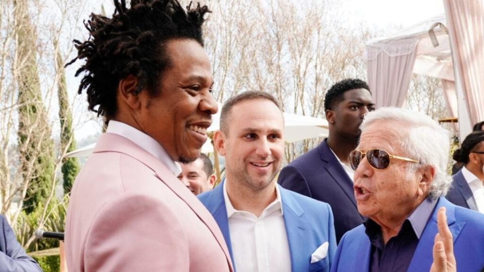 Rapper-mogul Jay-Z (left), Philadelphia 76ers owner Michael Rubin (center) and New England Patriots owner Robert Kraft (right) attend last January’s Roc Nation The Brunch in Los Angeles. (Photo by Erik Voake/Getty Images for Roc Nation)