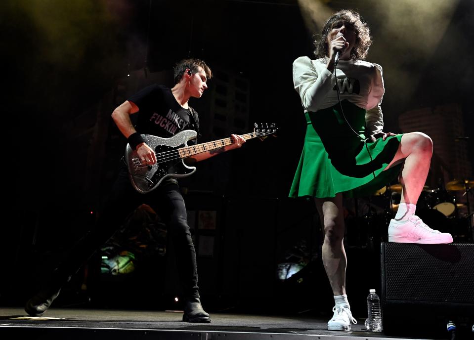 My Chemical Romance lead vocalist Gerard Way and bass guitarist Mikey Way perform at Bridgestone Arena on Tuesday, August 23, 2022, in Nashville, Tenn.  