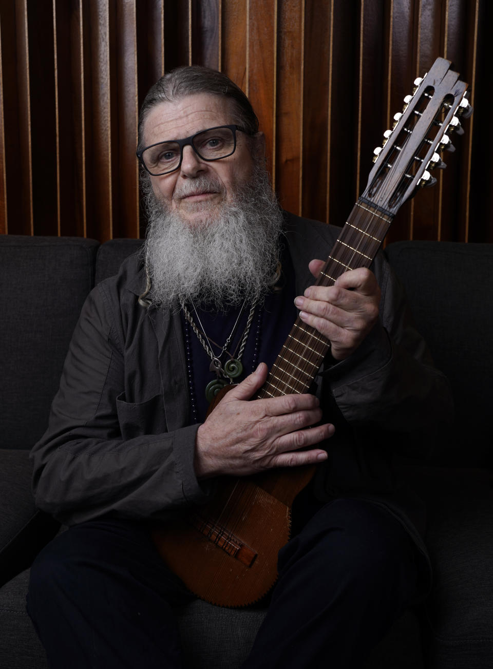 Composer Gustavo Santaolalla, a recipient of one of this year's Latin Grammys Trustees Awards, poses for a portrait in his home studio, Thursday, Aug. 17, 2023, in Los Angeles. (AP Photo/Chris Pizzello)