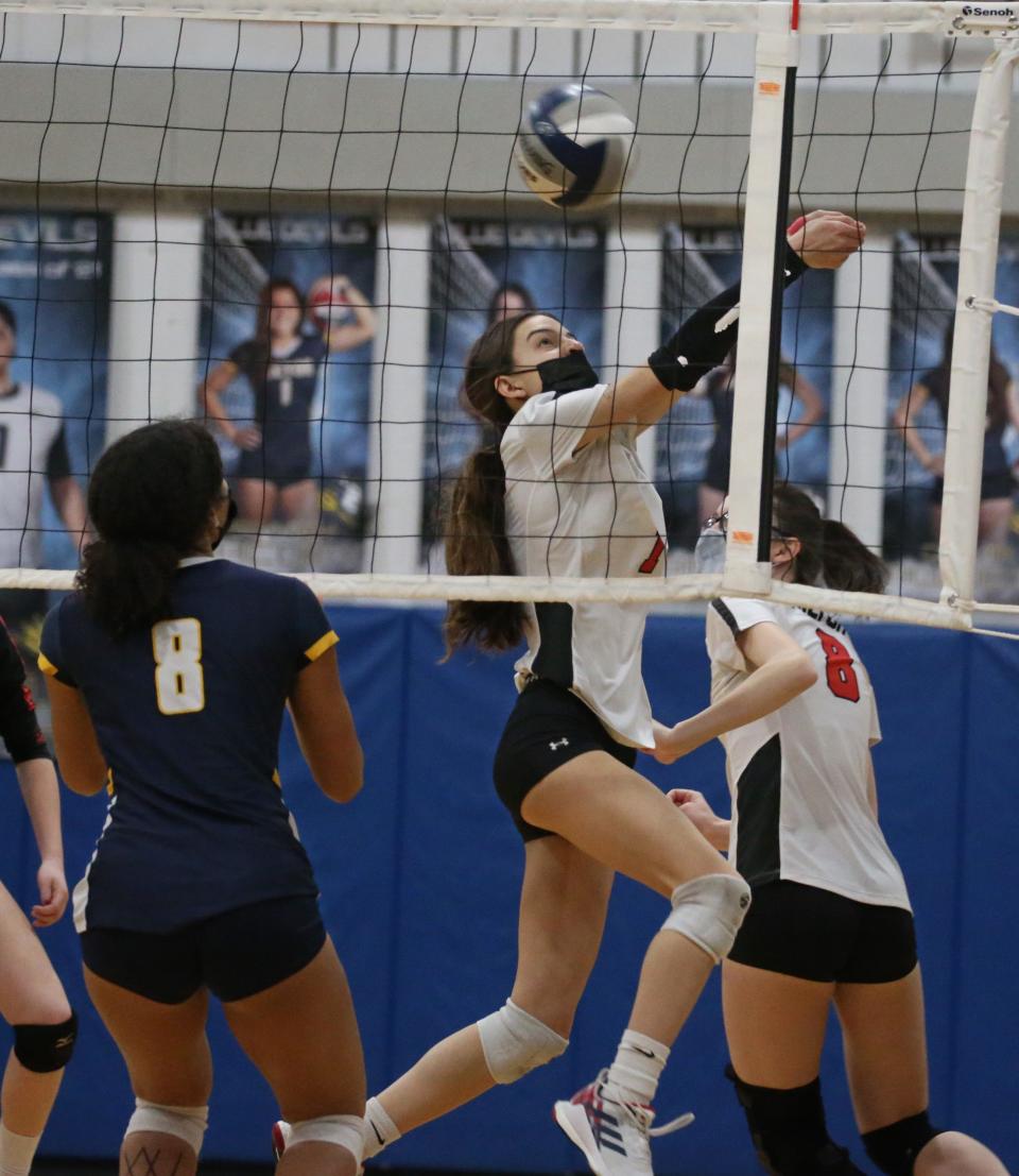 Hilton's MacKenzie Gerig saves the ball and keeps it in play during their Section V matchup against Victor Monday, April 5, 2021 at Victor High School.  