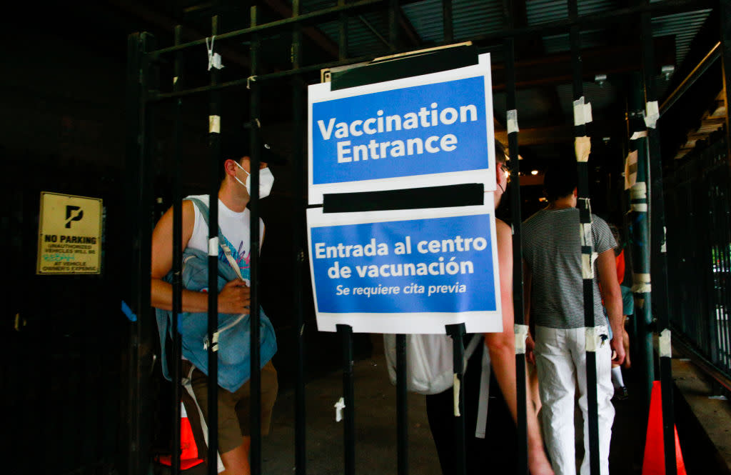 People wait in line to recieve the Monkeypox vaccine.