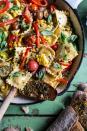 <p>Pretty pasta points right <em>hurr.</em> </p><p>Get the recipe from <a rel="nofollow noopener" href="http://www.halfbakedharvest.com/garden-veggie-and-ravioli-skillet-with-pistachio-herb-butter/" target="_blank" data-ylk="slk:Half Baked Harvest;elm:context_link;itc:0;sec:content-canvas" class="link ">Half Baked Harvest</a>.</p>