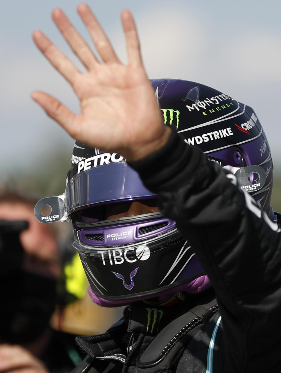 Mercedes driver Lewis Hamilton of Britain celebrates after he clocked the fastest time during the qualifying session for the Hungarian Formula One Grand Prix, at the Hungaroring racetrack in Mogyorod, Hungary, Saturday, July 31, 2021. The Hungarian Formula One Grand Prix will be held on Sunday. (David W Cerny/Pool via AP)