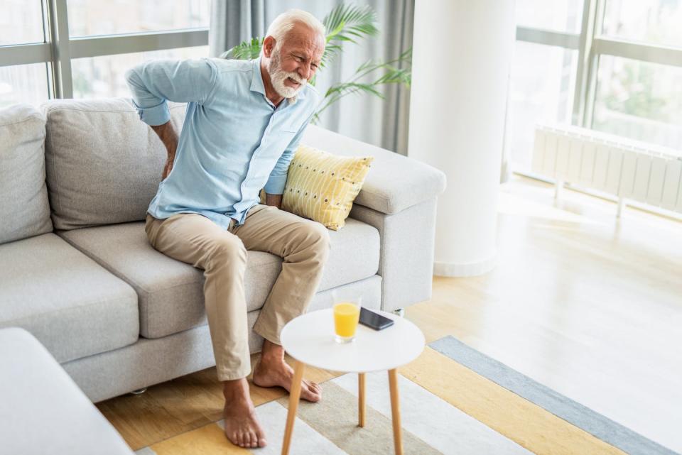 Because of the common misconception that lower back pain mainly afflicts middle-aged working people, the conditions is often overlooked in older adults. <a href="https://www.gettyimages.com/detail/photo/senior-man-having-backache-again-royalty-free-image/1273509861?phrase=low+back+pain&adppopup=true" rel="nofollow noopener" target="_blank" data-ylk="slk:DjelicS/E+ via Getty Images;elm:context_link;itc:0;sec:content-canvas" class="link ">DjelicS/E+ via Getty Images</a>