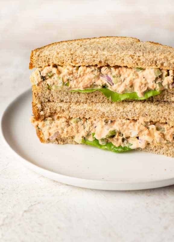 <p>Salt and Lavender</p><p>This salmon salad is made with canned salmon and comes together quickly! It's similar to tuna salad, so it's great in sandwiches for easy lunches.</p><p><strong>Get the recipe: <a href="https://www.saltandlavender.com/canned-salmon-salad/" rel="nofollow noopener" target="_blank" data-ylk="slk:Canned Salmon Salad;elm:context_link;itc:0;sec:content-canvas" class="link ">Canned Salmon Salad</a></strong></p>