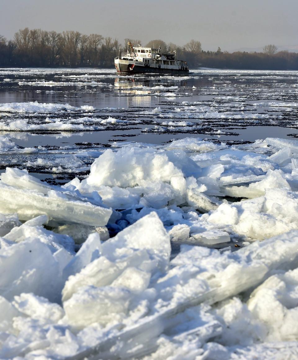 The Szechenyi ice breaking ship cuts floes on the River Danube near Dunakeszi, just north of Budapest on its way to the Hungarian capital from Gonyu, 108 kms west of Budapest, Hungary, Wednesday, Jan. 11, 2017. (Zoltan Mathe/MTI via AP)