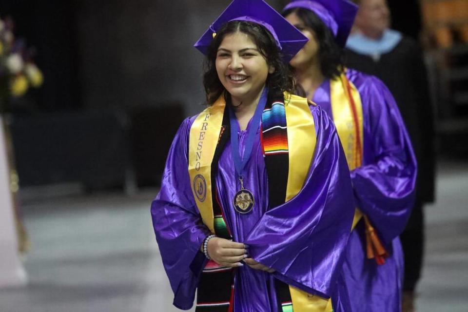 Erica Bailey Urena smiles during the Fresno High graduation ceremony held at the Save Mart Center on June 5, 2023.