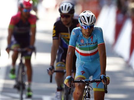 Astana rider Vincenzo Nibali of Italy crosses the finish line after crashed during the 191.5-km (118.9 miles) 6th stage of the 102nd Tour de France cycling race from Abbeville to Le Havre, France, July 9, 2015. REUTERS/Stefano Rellandini -