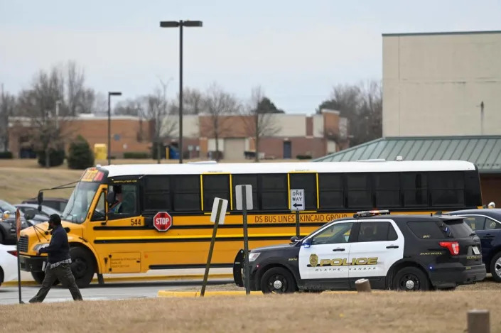 Students at Olathe East High School were taken to California Trail Middle School for reunification with parents and family after a shooting Friday, March 4, at Olathe East High School which left three people, including the shooter, injured.